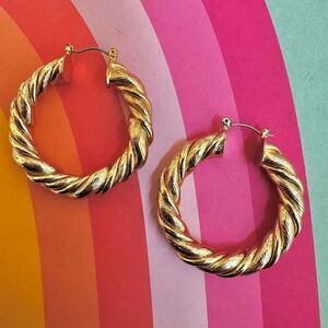 Gold tone twisted hoop earrings